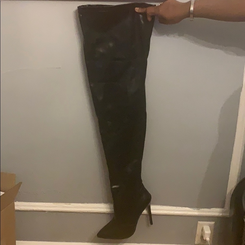 Long thigh high boots heels